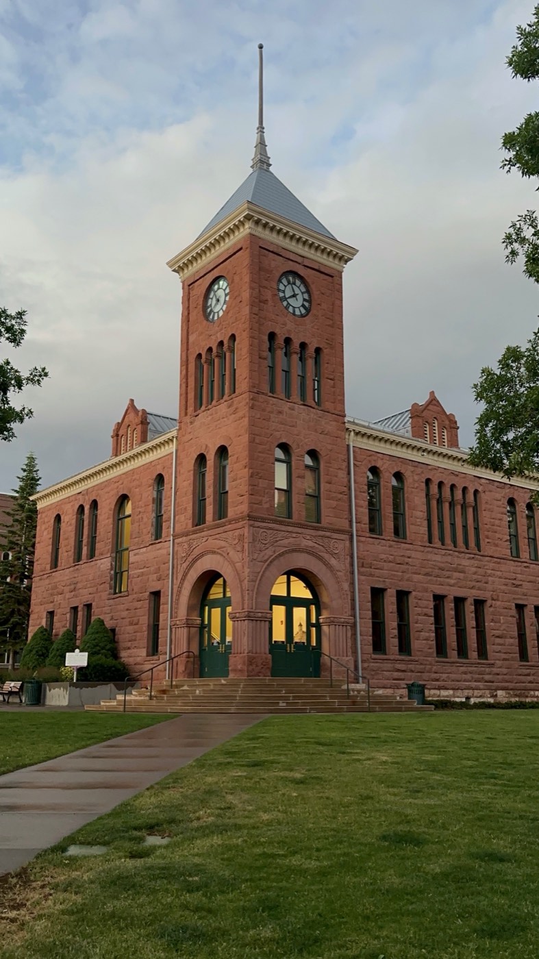 The Coconino County courthouse clock tower at dusk